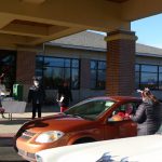 visitors arrive at the offices of david l. carrier for the cookie and cocoa drive-by